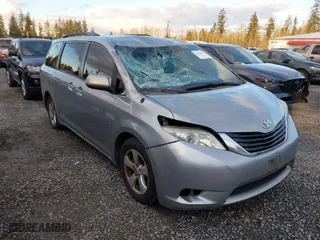2014 Toyota Sienna LE AAS with VIN 5TDKK3DC0ES410102, listed as a IAAI auction lot 41484303 with 269,302 mi miles. Bid and sale history available at carsss.com. Image 1.