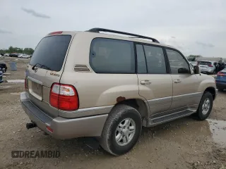 1999 Lexus LX 470 with VIN JT6HT00W2X0043805, listed as a Copart auction lot 54496735 with 520,244 mi miles and Clean Title. Bid and sale history available at DreamBid. Image 3.