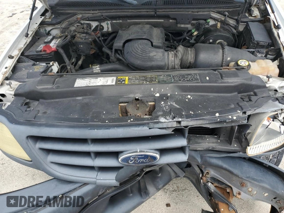 2002 Ford F-150 XL with VIN 1FTRF17W32NB86385, listed as a Copart auction lot 73276754 with 100,817 mi miles and Salvage Title. Bid and sale history available at carsss.com. Image 12.