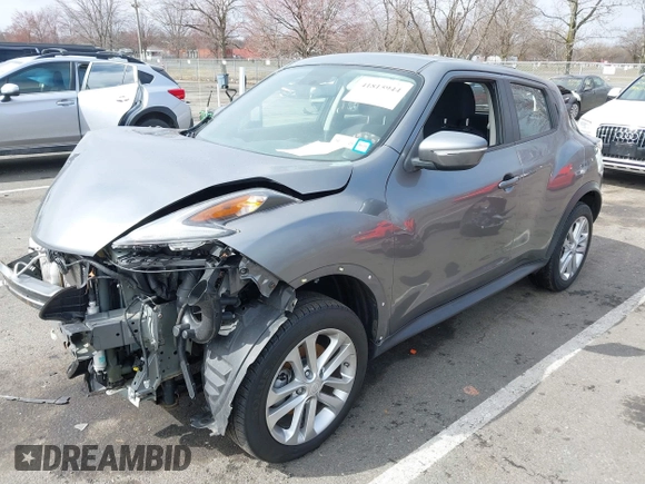 2015 Nissan Juke SV with VIN JN8AF5MVXFT553675, listed as a IAAI auction lot 41815944 with 100,000 mi miles and . Bid and sale history available at DreamBid. Image 2.