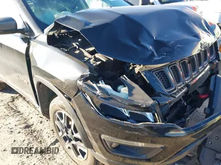 2020 Jeep Compass Trailhawk with VIN 3C4NJDDB4LT220965, listed as a IAAI auction lot 41742194 with 121,704 mi miles and . Bid and sale history available at carsss.com. Image 6.