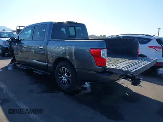 2021 Nissan Titan SV with VIN 1N6AA1EF2MN504611, listed as a IAAI auction lot 41469990 with 81,432 mi miles and . Bid and sale history available at DreamBid. Image 3.