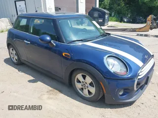 2014 MINI Hardtop with VIN WMWXM5C50ET972174, listed as a IAAI auction lot 42738144 with 106,273 mi miles and . Bid and sale history available at DreamBid. Image 1.