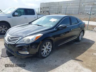 2012 Hyundai Azera with VIN KMHFH4JGXCA146499, listed as a IAAI auction lot 42519685 with 132,262 mi miles and . Bid and sale history available at DreamBid. Image 2.