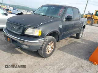 2001 Ford F-150 XLT with VIN 1FTRW08L61KD90032, listed as a IAAI auction lot 42385610 with 164,252 mi miles and . Bid and sale history available at DreamBid. Image 2.