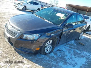 2014 Chevrolet Cruze LS with VIN 1G1PA5SG2E7382347, listed as a IAAI auction lot 41377497 with 140,765 mi miles and . Bid and sale history available at DreamBid. Image 2.
