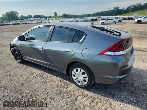 2012 Honda Insight LX with VIN JHMZE2H52CS005731, listed as a Copart auction lot 64077625 with 157,026 mi miles and Non repairable. Bid and sale history available at DreamBid. Image 2.