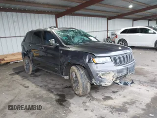 2016 Jeep Grand Cherokee 75th Anniversary z VIN 1C4RJFAG4GC489479, wystawiony jako IAAI lot #41090216 z przebiegiem 92 747 mil mil oraz . Historia ofert i sprzedaży dostępna na DreamBid. Obrazek 1.