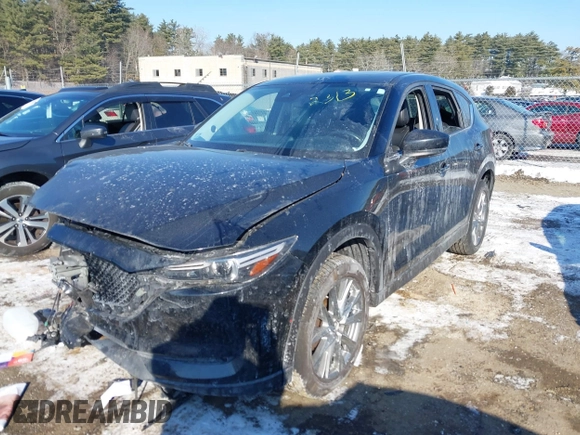 2020 Mazda CX-5 Grand Touring with VIN JM3KFBDM7L1807685, listed as a IAAI auction lot 41392313 with 91,729 mi miles and . Bid and sale history available at carsss.com. Image 17.