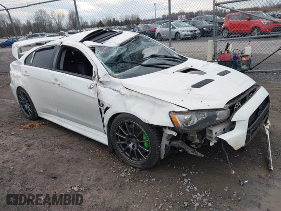2014 Mitsubishi Lancer Evolution GSR with VIN JA32W8FV5EU012572, listed as a IAAI auction lot 40871463 with 89,529 mi miles. Bid and sale history available at carsss.com. Image 1.
