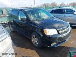 2014 Dodge Grand Caravan SXT with VIN 2C4RDGBG7ER197065, listed as a IAAI auction lot 41674441 with 233,065 mi miles. Bid and sale history available at carsss.com. Image 1.