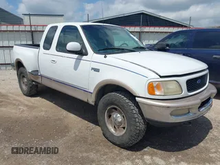 1997 Ford F-150 z VIN 1FTDX08W3VKD14758, wystawiony jako IAAI lot #42491545 z przebiegiem 154 640 mil mil oraz . Historia ofert i sprzedaży dostępna na DreamBid. Obrazek 1.