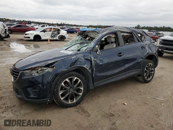 2016 Mazda CX-5 Grand Touring with VIN JM3KE4DY3G0797301, listed as a Copart auction lot 88356205 with Not Provided miles and Non Repairable. Bid and sale history available at carsss.com. Image 1.