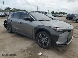 2024 Toyota bZ4X XLE with VIN JTMAAAAA9RA032841, listed as a Copart auction lot 72791844 with 8,833 mi miles and Salvage Title. Bid and sale history available at carsss.com. Image 4.