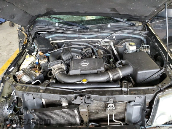 2010 Nissan Xterra S z VIN 5N1AN0NW3AC506047, wystawiony jako Copart lot #43036805 z przebiegiem 231 861 mil mil oraz Szkoda całkowita • Salvage title. Historia ofert i sprzedaży dostępna na DreamBid. Obrazek 13.