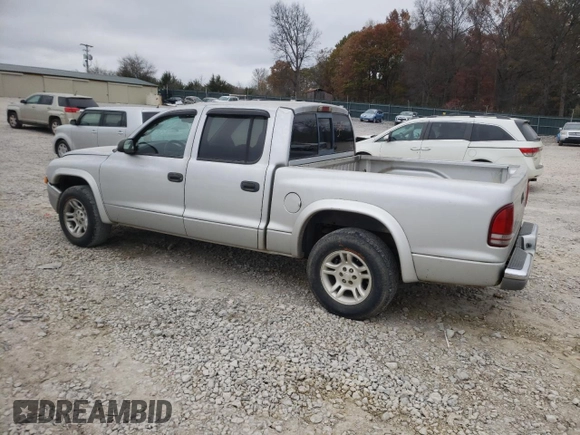 2003 Dodge Dakota SLT with VIN 1D7HL48X13S151334, listed as a Copart auction lot 82016764 with 216,281 mi miles and Salvage Title. Bid and sale history available at carsss.com. Image 2.