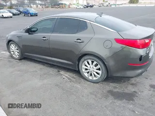 2014 Kia Optima EX with VIN 5XXGN4A79EG342071, listed as a IAAI auction lot 41732824 with Not Provided miles and . Bid and sale history available at carsss.com. Image 3.