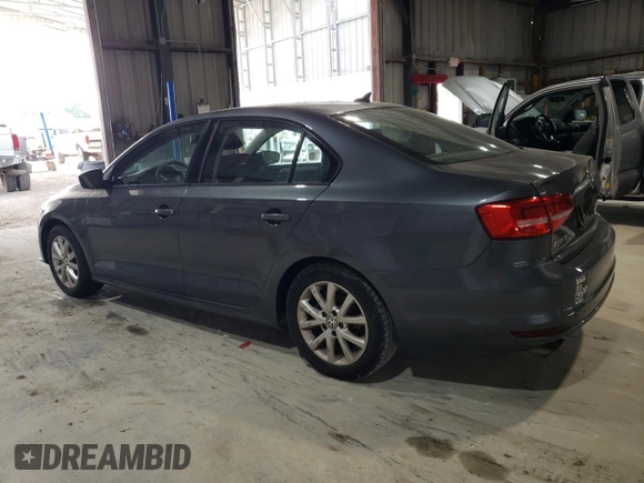 2015 Volkswagen Jetta SE с VIN 3VWD17AJ4FM325204, выставлен на аукционе Copart как лот 59141575 с пробегом Не указан миль и Списание • Salvage title. История ставок и продаж доступна на DreamBid. Изображение 2.