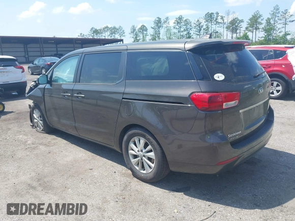 2017 Kia Sedona LX with VIN KNDMB5C15H6225200, listed as a IAAI auction lot 41929710 with 144,461 mi miles. Bid and sale history available at carsss.com. Image 3.