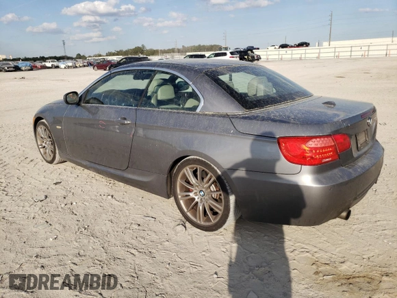2011 BMW 3 Series 335i with VIN WBADX7C5XBE580244, listed as a Copart auction lot 44993215 with 124,091 mi miles and Salvage Title. Bid and sale history available at carsss.com. Image 2.