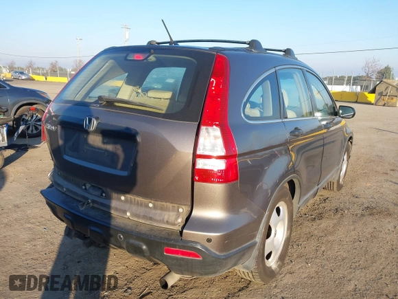 2009 Honda CR-V LX with VIN 5J6RE48389L011915, listed as a IAAI auction lot 41301796 with 214,807 mi miles. Bid and sale history available at carsss.com. Image 4.