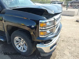 2014 Chevrolet Silverado 1500 LT with VIN 1GCVKREH9EZ282578, listed as a IAAI auction lot 42062801 with 163,158 mi miles and . Bid and sale history available at DreamBid. Image 17.