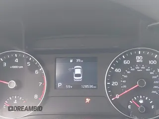 2019 Kia Forte LXS z VIN 3KPF24AD6KE041448, wystawiony jako IAAI lot #42035571 z przebiegiem 128 536 mil mil oraz . Historia ofert i sprzedaży dostępna na DreamBid. Obrazek 15.