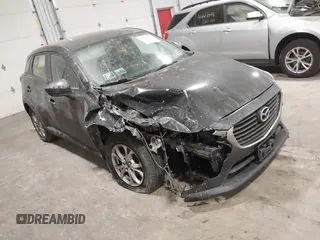 2016 Mazda CX-3 Sport with VIN JM1DKFB71G0128539, listed as a IAAI auction lot 41423004 with 80,545 mi miles. Bid and sale history available at carsss.com. Image 1.