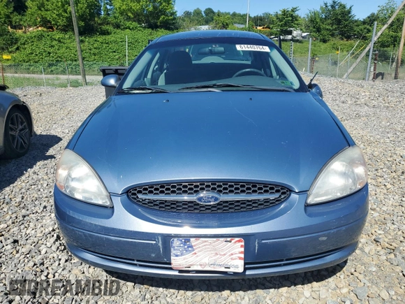 2001 Ford Taurus SE with VIN 1FAFP53U61A161763, listed as a Copart auction lot 43317165 with 64,025 mi miles and Salvage title. Bid and sale history available at DreamBid. Image 5.