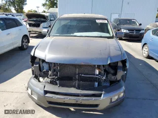 2011 Honda Ridgeline RTL with VIN 5FPYK1F58BB452957, listed as a Copart auction lot 63214204 with 223,311 mi miles and Salvage Title. Bid and sale history available at carsss.com. Image 5.