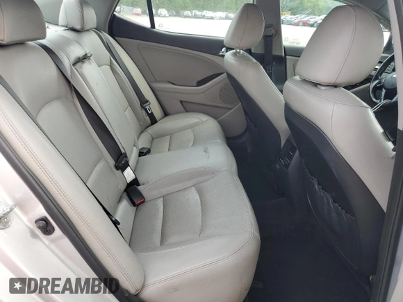 2013 Kia Optima EX z VIN 5XXGN4A79DG217554, wystawiony jako Copart lot #59667065 z przebiegiem 102 482 mil mil oraz Szkoda całkowita • Salvage title. Historia ofert i sprzedaży dostępna na DreamBid. Obrazek 10.