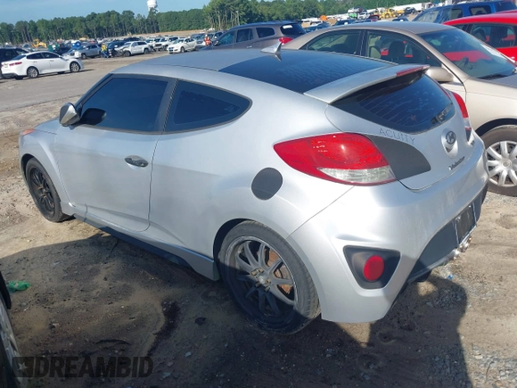 2013 Hyundai Veloster Turbo with VIN KMHTC6AE5DU112756, listed as a IAAI auction lot 42854505 with 99,015 mi miles and . Bid and sale history available at DreamBid. Image 3.
