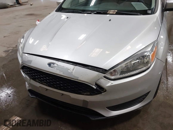 2015 Ford Focus SE with VIN 1FADP3F28FL231684, listed as a IAAI auction lot 41914284 with 100,195 mi miles. Bid and sale history available at carsss.com. Image 6.