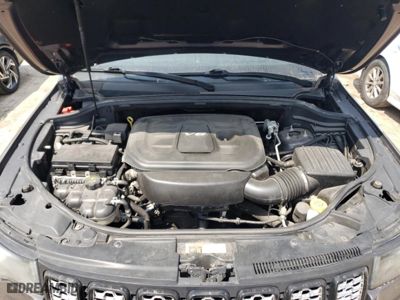 2018 Jeep Grand Cherokee Laredo E with VIN 1C4RJFAG6JC387334, listed as a Copart auction lot 64197034 with 57,992 mi miles and Salvage Title. Bid and sale history available at carsss.com. Image 12.