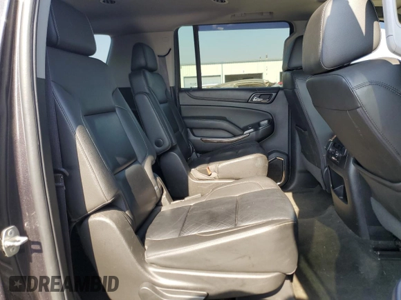 2016 Chevrolet Suburban LT z VIN 1GNSKHKC1GR198058, wystawiony jako Copart lot #56909335 z przebiegiem 150 907 mil mil oraz Szkoda całkowita • Salvage title. Historia ofert i sprzedaży dostępna na DreamBid. Obrazek 11.