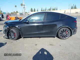 2022 Tesla Model Y Performance with VIN 7SAYGDEF5NF336693, listed as a IAAI auction lot 41805752 with 42,009 mi miles and . Bid and sale history available at DreamBid. Image 13.