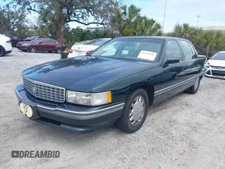 1996 Cadillac DeVille z VIN 1G6KF5298TU269234, wystawiony jako IAAI lot #41345945 z przebiegiem 34 218 mil mil oraz . Historia ofert i sprzedaży dostępna na DreamBid. Obrazek 2.