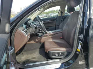 2018 BMW 7 Series 740i xDrive with VIN WBA7E4C54JGV23901, listed as a Copart auction lot 77322824 with 70,922 mi miles and Salvage Title. Bid and sale history available at carsss.com. Image 7.