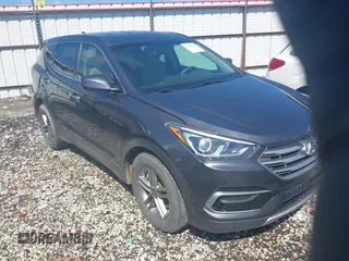 2017 Hyundai Santa Fe 2.4L z VIN 5XYZTDLB4HG499703, wystawiony jako IAAI lot #42124125 z przebiegiem 129 936 mil mil oraz . Historia ofert i sprzedaży dostępna na DreamBid. Obrazek 1.