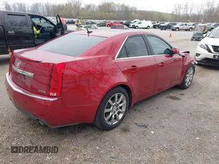 2008 Cadillac CTS RWD w/1SA with VIN 1G6DF577880150615, listed as a IAAI auction lot 42071662 with 115,304 mi miles. Bid and sale history available at carsss.com. Image 4.