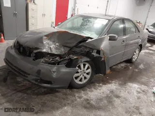 2004 Toyota Camry LE with VIN 4T1BF30K54U578096, listed as a IAAI auction lot 41528597 with 226,027 mi miles. Bid and sale history available at carsss.com. Image 2.