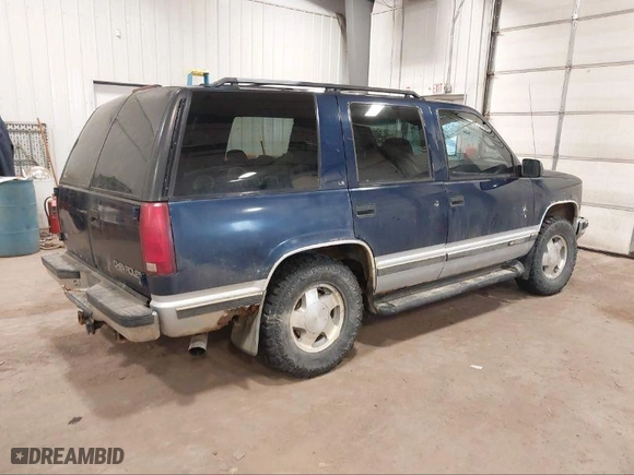 1996 Chevrolet Tahoe with VIN 1GNEK13R3TJ359476, listed as a IAAI auction lot 39579992 with 258,505 mi miles. Bid and sale history available at carsss.com. Image 4.