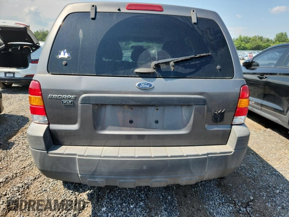 2005 Ford Escape XLT with VIN 1FMYU93135DA09027, listed as a Copart auction lot 63322395 with 144,020 mi miles and Clean title. Bid and sale history available at DreamBid. Image 6.