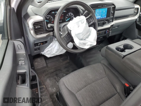 2021 Ford F-150 XL with VIN 1FTMF1EP8MKE68354, listed as a Copart auction lot 84733944 with 97,313 mi miles and Salvage title. Bid and sale history available at DreamBid. Image 8.