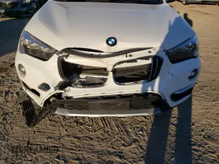 2018 BMW X1 xDrive28i with VIN WBXHT3C38J5L31384, listed as a Copart auction lot 66323172 with 74,272 mi miles. Bid and sale history available at carsss.com. Image 9.