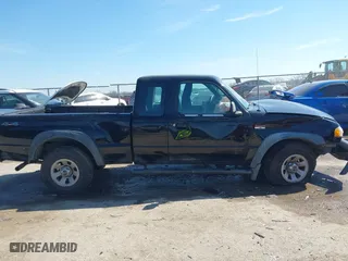 2005 Mazda B-Series 4WD Truck SE with VIN 4F4ZR47E35PM03255, listed as a IAAI auction lot 41596707 with 1 mi miles. Bid and sale history available at carsss.com. Image 13.