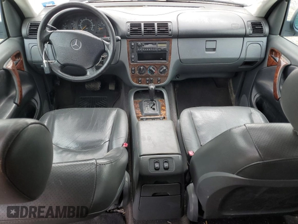 1999 Mercedes-Benz M 320/430/500 with VIN 4JGAB54E9XA127797, listed as a Copart auction lot 51408235 with 243,566 mi miles and Salvage title. Bid and sale history available at DreamBid. Image 8.