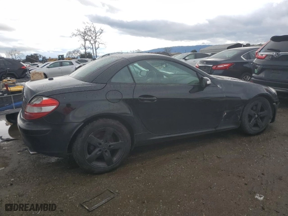 2006 Mercedes-Benz SLK-Class 3.0L with VIN WDBWK54F56F090959, listed as a Copart auction lot 44212375 with 154,683 mi miles and Salvage Title. Bid and sale history available at carsss.com. Image 3.