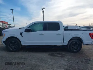 2023 Ford F-150 XL with VIN 1FTEW1C53PFB19119, listed as a IAAI auction lot 41580371 with 35,040 mi miles and . Bid and sale history available at DreamBid. Image 14.