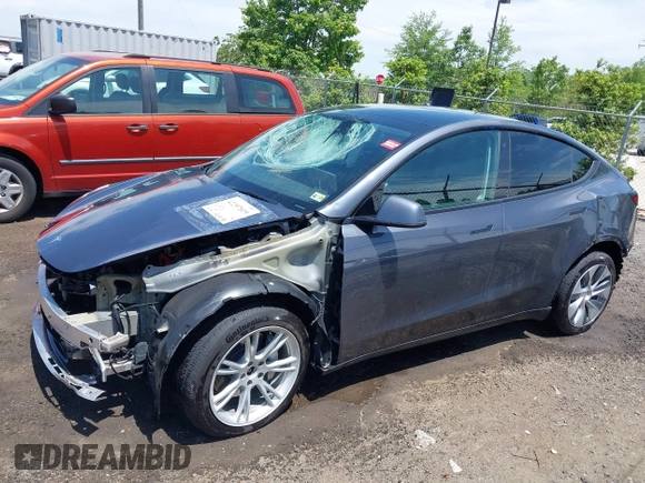 2023 Tesla Model Y Long Range with VIN 7SAYGAEE7PF615751, listed as a IAAI auction lot 42297819 with 31,201 mi miles and . Bid and sale history available at DreamBid. Image 15.